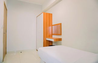 Photo 2 - Homey And Modern 2Br At The Mansion Kemayoran Apartment