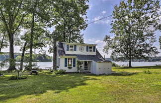 Photo 1 - Lakefront Cottage w/ Covered Porch & Dock