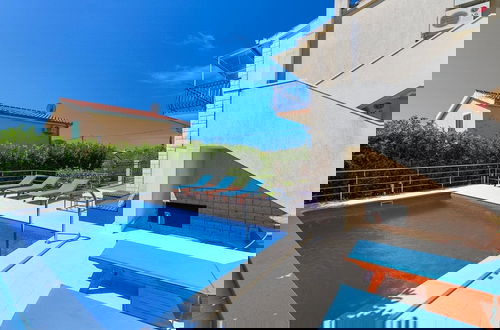 Photo 33 - Relaxing Holiday Home With Pool, Fitness Area, and Entertainment Facilities