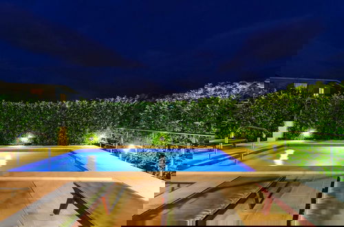 Photo 37 - Relaxing Holiday Home With Pool, Fitness Area, and Entertainment Facilities