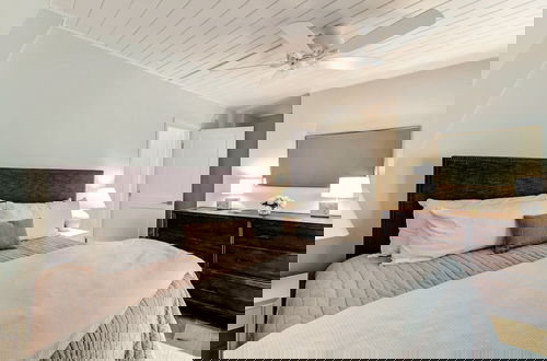 Photo 2 - Roomy Chalet-Style Beachfront Condo with Private Beach Access by RedAwning