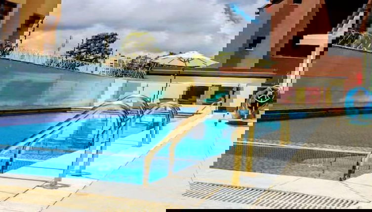 Photo 1 - Myriad stays beachfront