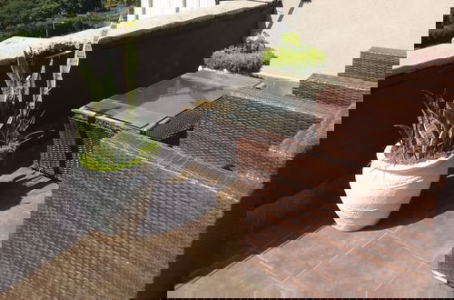 Foto 14 - Myriad stays beachfront