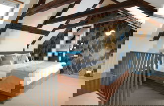 Photo 2 - Golden Angel Suites by Adrez Living