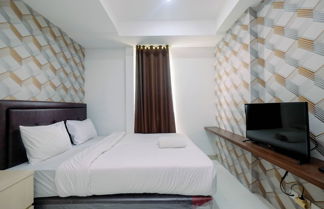 Photo 2 - Relaxing Studio Apartment at Azalea Suites Cikarang