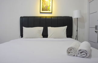 Photo 1 - Elegant and Comfy Studio at Bassura City Apartment