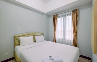 Photo 1 - Elegant and Comfort 2BR at Royal Heights Apartment