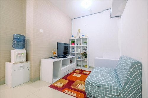 Photo 9 - Furnished Green Pramuka 1BR Apartment with Modern Style and City View