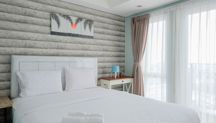 Photo 1 - Elegant and Cozy 1BR Apartment at Bintaro Plaza Residence