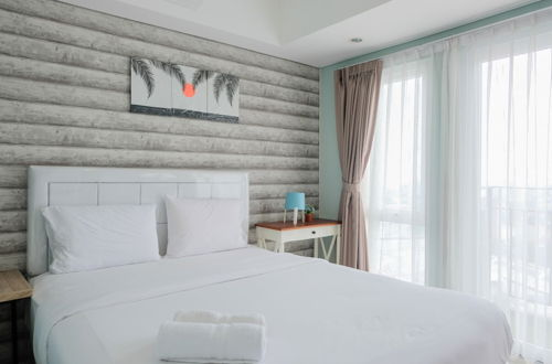 Photo 1 - Elegant and Cozy 1BR Apartment at Bintaro Plaza Residence