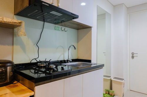 Photo 7 - Elegant and Cozy 1BR Apartment at Bintaro Plaza Residence