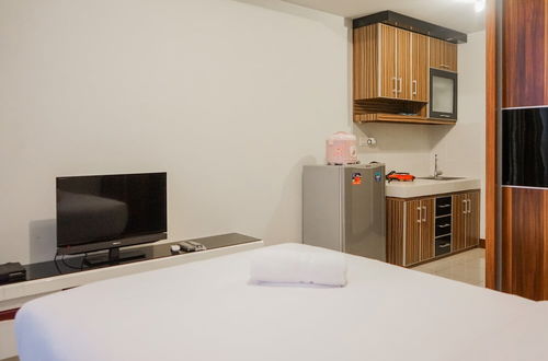 Photo 3 - Comfy and Minimalist Studio Apartment Scientia Residence Tower B