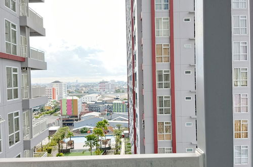 Photo 14 - Homey And Tidy Studio Apartment At Vida View Makassar