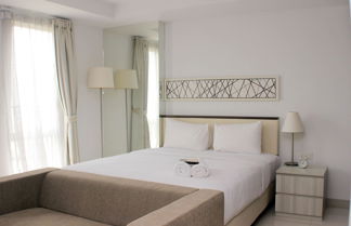 Photo 2 - Comfort And Minimalist Studio At Azalea Suites Apartment