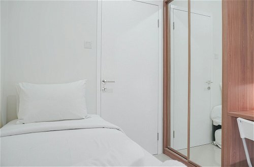 Photo 5 - Restful and Tidy 2BR at Green Pramuka City Apartment