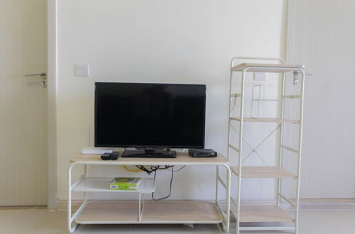 Photo 8 - Fully Furnished 2BR at Meikarta Apartment with Working Room