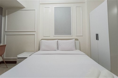 Photo 3 - White And Cozy Studio At Vida View Makassar Apartment