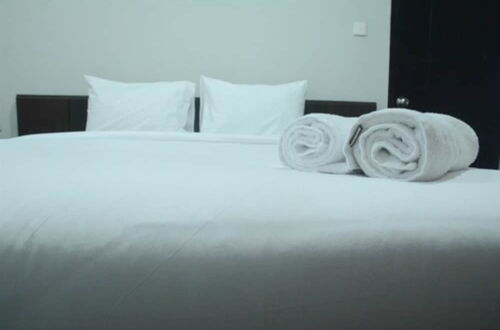 Foto 3 - Cozy 2BR Cosmo Residence Apartment near Thamrin City Mall