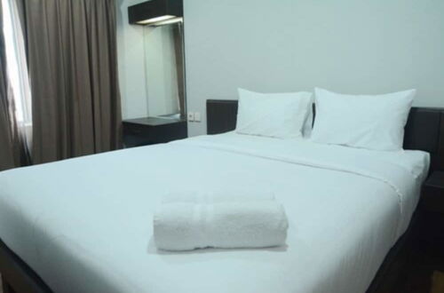 Foto 2 - Cozy 2BR Cosmo Residence Apartment near Thamrin City Mall