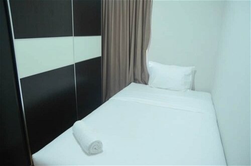Photo 7 - Cozy 2BR Cosmo Residence Apartment near Thamrin City Mall