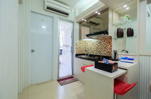 Photo 16 - Comfy 2BR Bassura City Apartment Near Bassura Mall