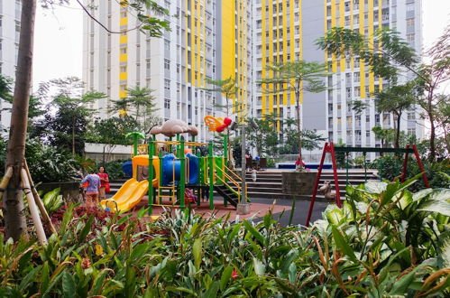 Photo 32 - Minimalist Studio Room at The Springlake Apartment Sumarecon Bekasi