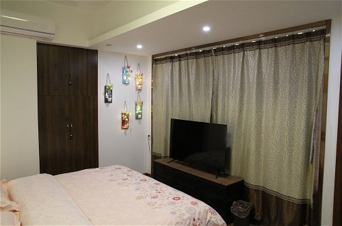Foto 15 - nanjing weibao home apartment