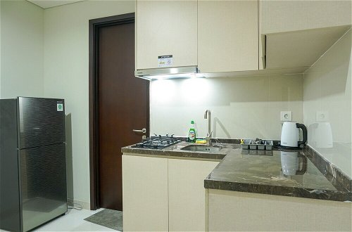 Photo 9 - Strategic Location 1BR Apartment @ Puri Mansion near Puri By Travelio