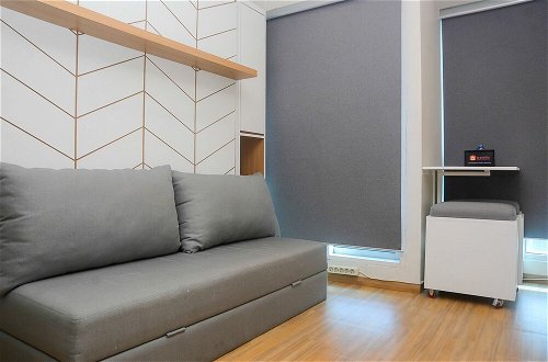 Photo 10 - Best Studio Room with Wall Bed Tifolia Apartment