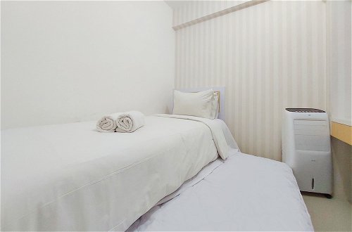 Photo 3 - Comfort 2Br Apartment At Bassura City