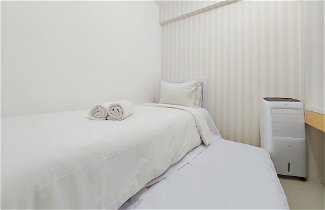 Photo 3 - Comfort 2Br Apartment At Bassura City