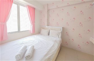 Photo 2 - Comfort 2Br Apartment At Bassura City