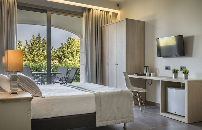 Astra Village Hotel Suites - Photo 30