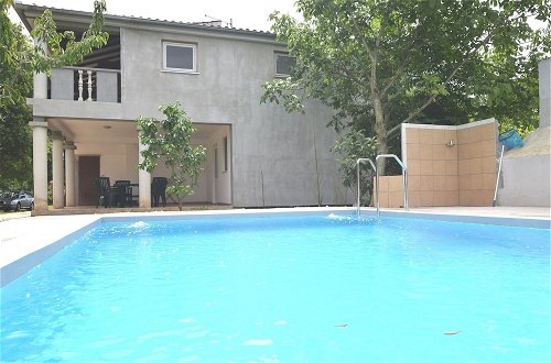 Photo 12 - Apartment in Holiday Home With Pool