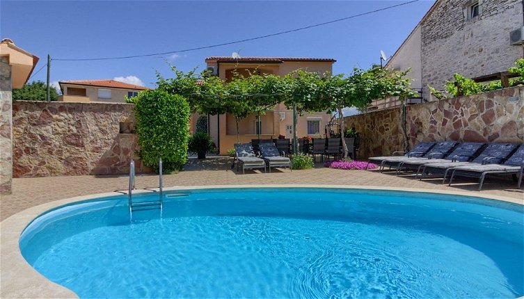 Foto 1 - Spacious Holiday Home in Peroj With Private Pool