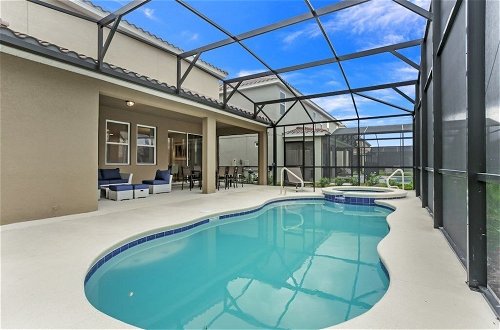 Photo 7 - South Facing Pool/spa, Game Room Is Loaded! 6 Bedroom Villa by Redawning