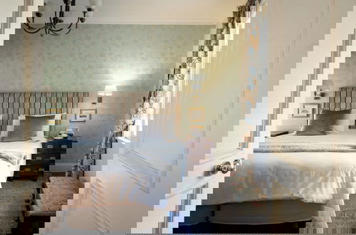 Foto 5 - De Waterkant Guest Suites