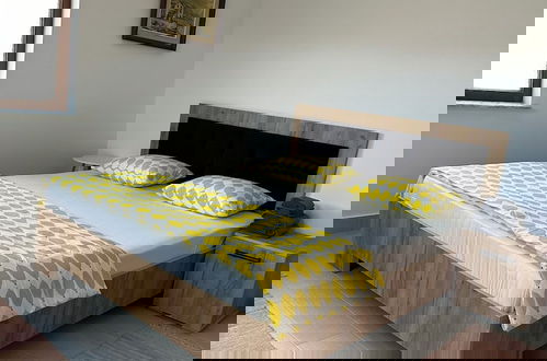 Foto 7 - Serenity Apartments and Studios