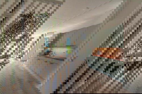 Foto 8 - Cozy Beachside Apartment
