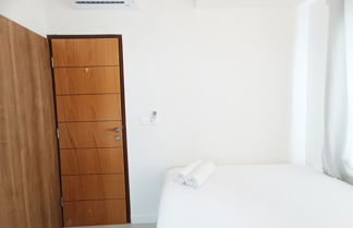 Foto 3 - Comfort 2Br At 28Th Floor Vida View Makassar Apartment