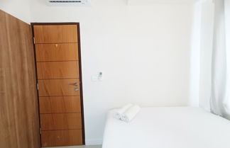 Photo 3 - Comfort 2Br At 28Th Floor Vida View Makassar Apartment