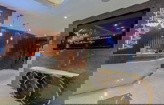 Photo 1 - Oak Plaza Suites