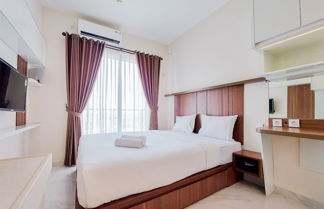 Photo 3 - Cozy And Nice Studio Apartment At Sky House Bsd