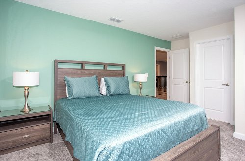 Foto 39 - Fantastic Eight Bedrooms SF w Screened Pool at Storey Lake Resort 2887