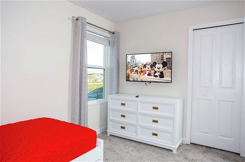 Foto 33 - Fantastic Eight Bedrooms SF w Screened Pool at Storey Lake Resort 2887