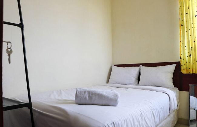 Homey And Comfortable 2Br Grand Sentraland Karawang Apartment - Photo 2