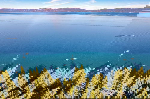 Photo 53 - Homewood Lakefront by Avantstay Private Beach & Lake Access + Views!