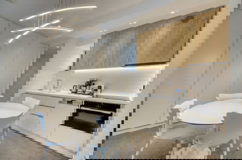 Foto 6 - GSM Elevated Luxury Suites