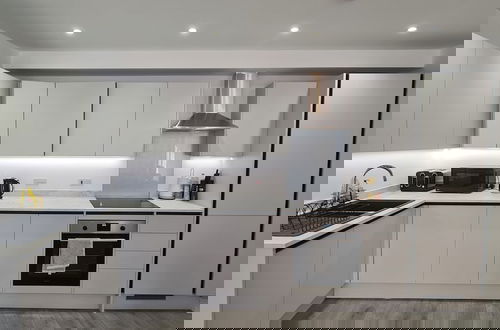 Foto 7 - Modern City Apartment
