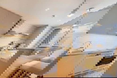 Foto 13 - Elegant 1BR Apartment Near Dubai Frame
